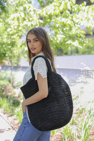 portefeuille en raphia noir