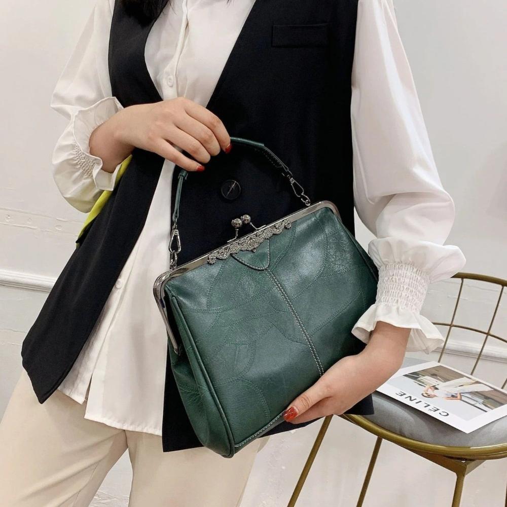 sac à main vintage à fermoir baiser