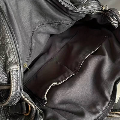 Sac à main élégant vintage en cuir noir